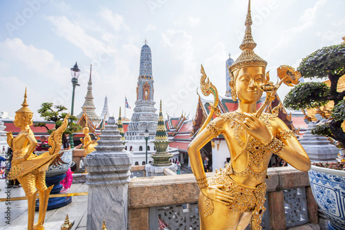 Golden statue of Kinnari at Grand Palace, Thailand. photo