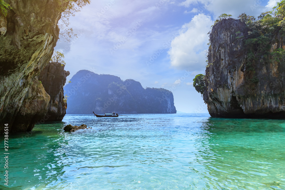Fototapeta premium Beach with crystal emerald green sea at Lao Lading Island in Andaman sea, Krabi, Thailand
