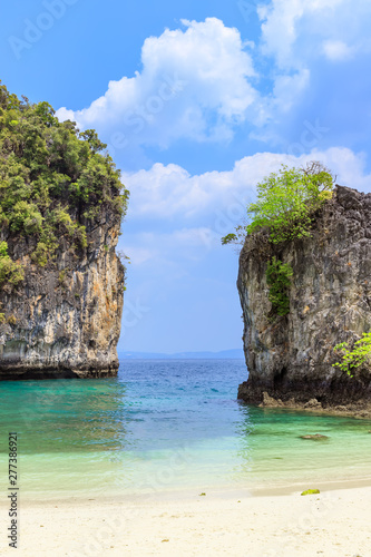 Beautiful cliff wall and beach with crystal clear sea to Koh Hong Island at Krabi, Thailand