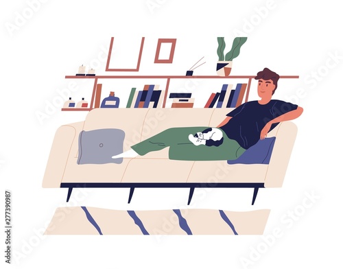 Cute happy boy lying on comfy couch with his cat. Young smiling man relaxing on cozy sofa at home. Cheerful male cartoon character performing daily leisure activity. Modern flat vector illustration.