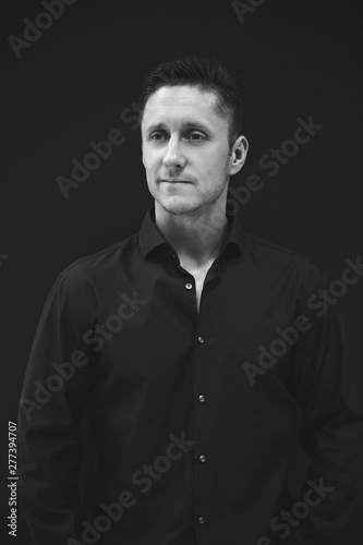 Business man in black shirt portrait