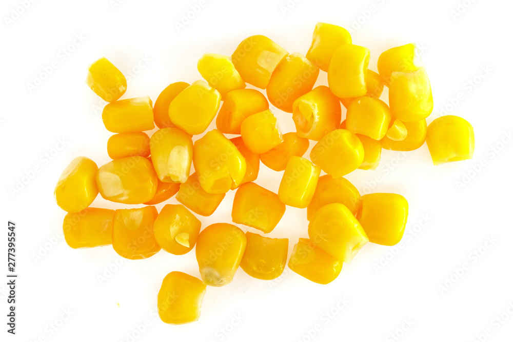 Fototapeta premium Yellow corn seeds isolated on white background close up. macro