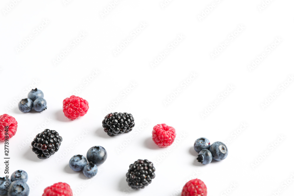 Flat lay composition with berries on white background, space for text Flat lay composition with berries on white background, space for text