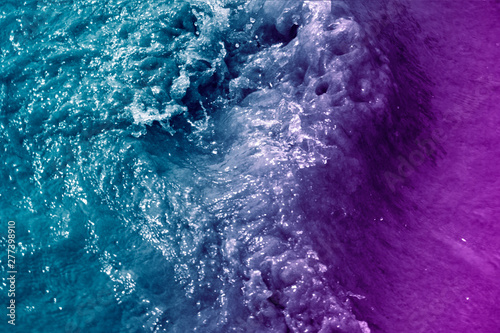 Abstract background sea wave surface with filtered color on blue and purple, can using for background 