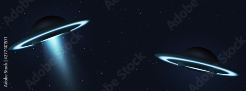 Unidentified flying object. Two UFOs flying on the horizon night sky. Futuristic ufo on Space stars background.
