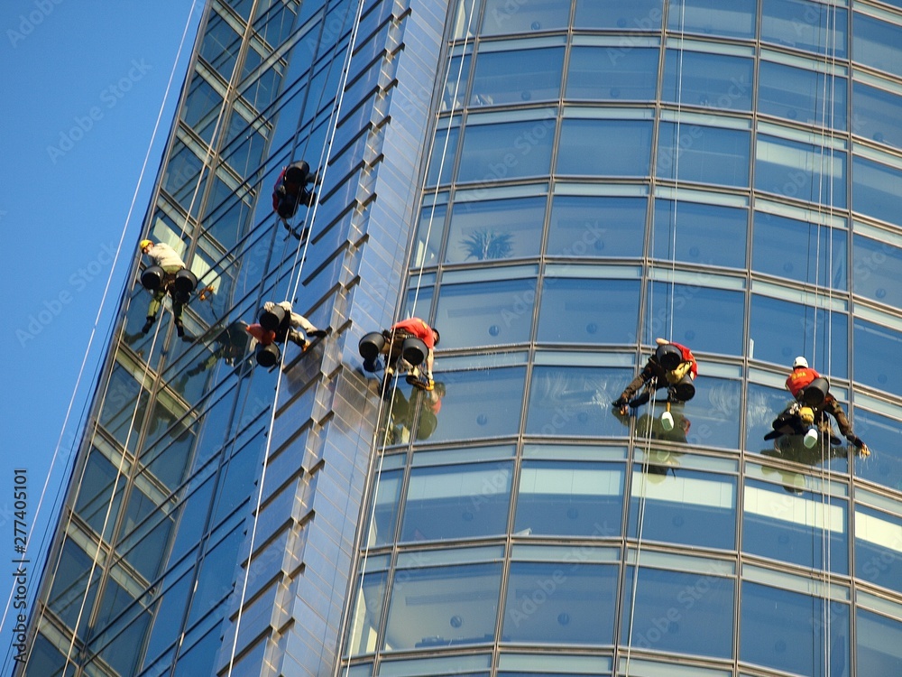 Workers washing windows