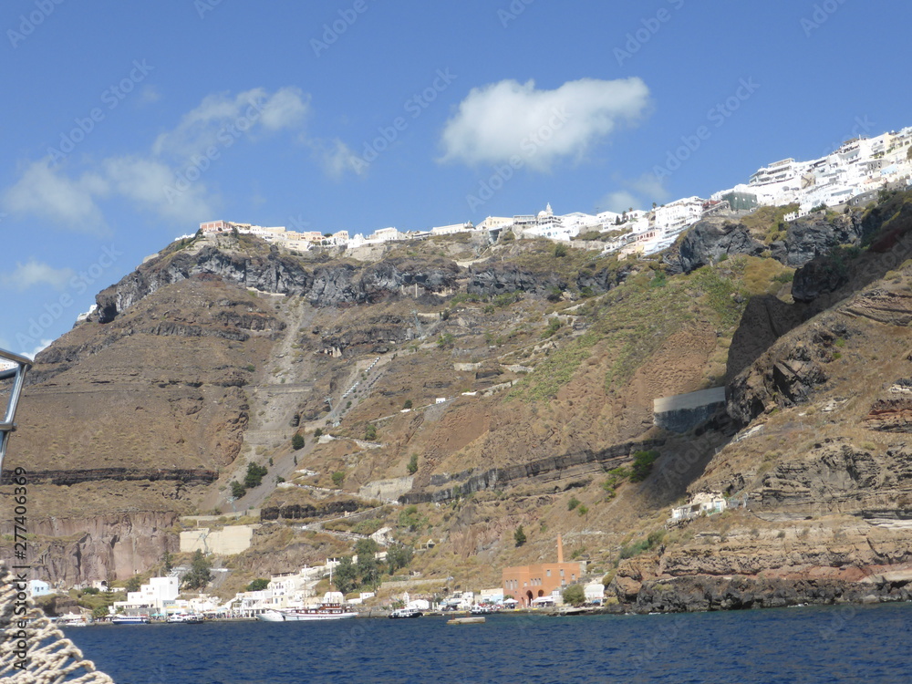 View of the donkey Trail and cable cars up to Thira (Fira) Santorini