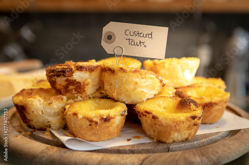 pile of custard pie on a plate with a blurred background