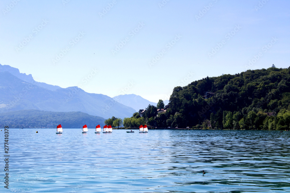 Panoramic view of the  lake and sailboats on the summer day.Annecy.France.
