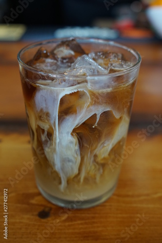 Iced Coffee with Cream on a Restaurant Bar