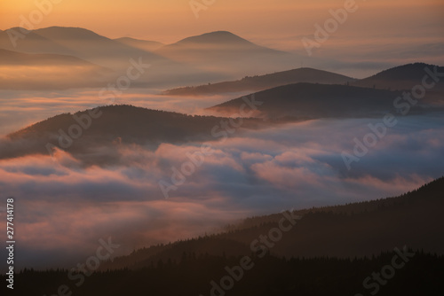 Morning fog in mountains