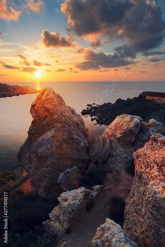 Sunset at Il-Qarraba. Mgarr, Malta photo
