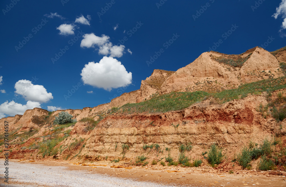 sea beach, wave and sand - beautiful summer landscape and travel concept, bright day and sky with clouds