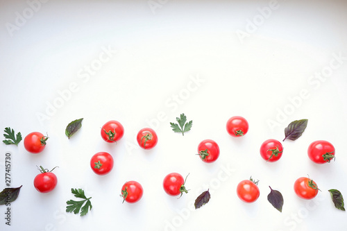 Cherry tomatoes on a white background. View from above