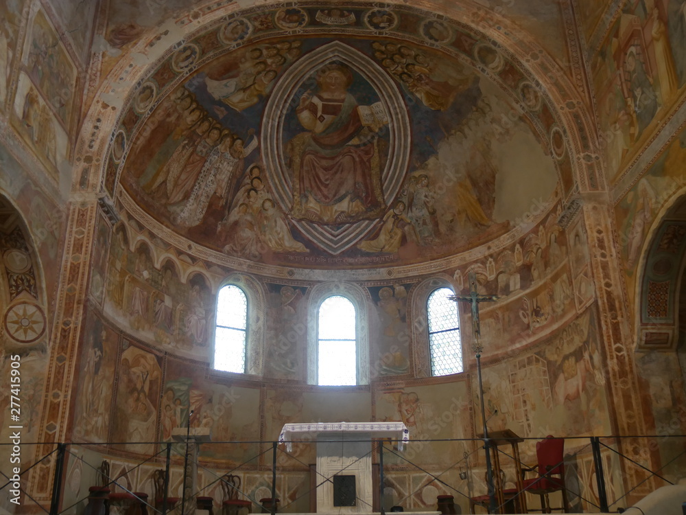 Pomposa Abbey interior Pomposa Abbey is a Benedictine monastery built in Romanesque style on the Adriatic coast of Italy. Inside the triple naves basilica there are floor mosaics and frescoes on the w
