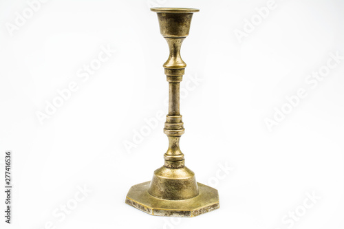 Retro candlestick made of bronze isolated on a white background.