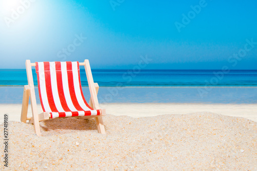 hammock on the sand of the beach, summer landscape and holidays