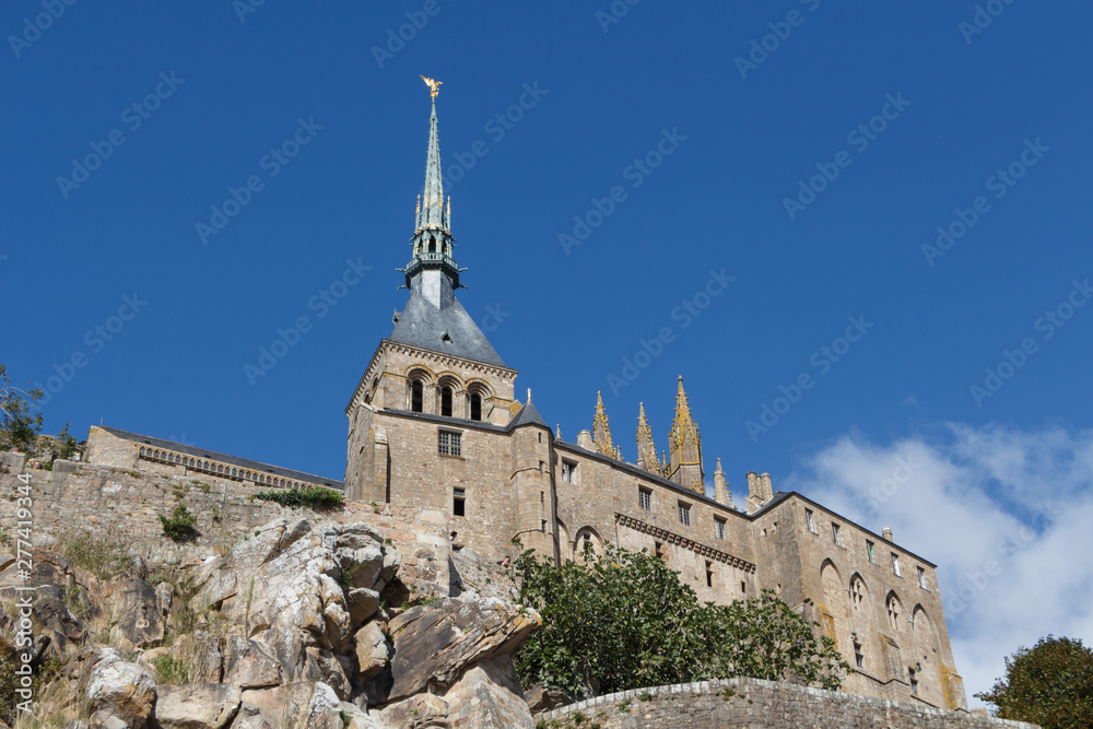 Abbey of Mont Saint-Michel against blue sky