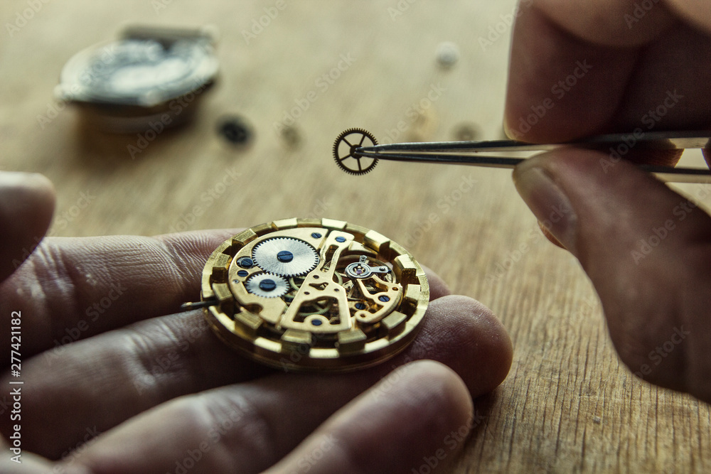 Watchmaker is repairing the wristwatch, mechanical watch Watchmaker is repairing the wristwatch, mechanical watch