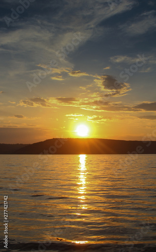 sunset over the sea © Dima