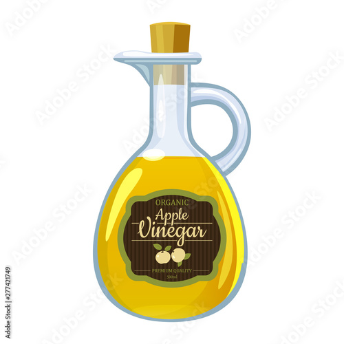 Apple cider vinegar in glass bottle. Label red apple
