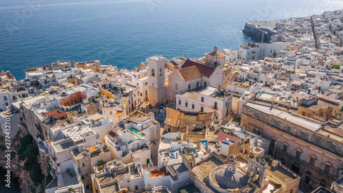 Aerial view of the beach lama monachile cala porto in the italian city polignano a mare sunrise photo