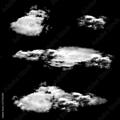 Set of isolated clouds on a black background.