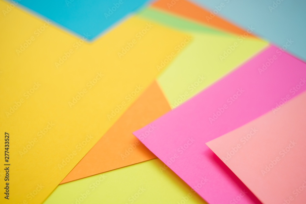 Colorful paper sheets as background, side view. Colorful paper sheets as background, side view.