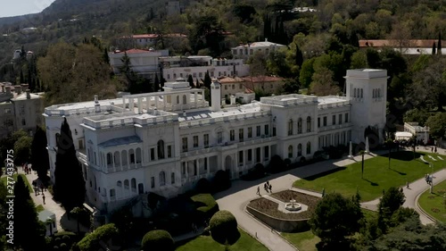Aerial drone footage of Livadia Palace with a beautiful landscaped garden in Crimea