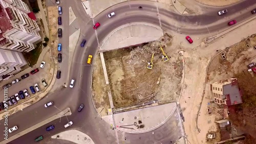Aerial view of roundabout in progress counter-clockwise