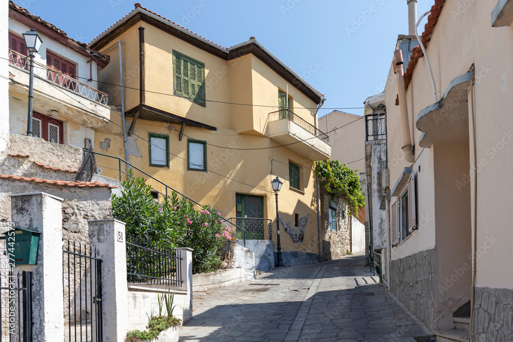 Typical street and houses at old town of city of Kavala, Greece