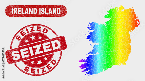 Spectral dot Ireland Island map and seal stamps. Red rounded Seized grunge seal. Gradiented spectral Ireland Island map mosaic of randomized circle. Seized seal with grunge texture.