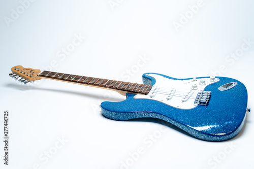 blue electric guitar at an angle