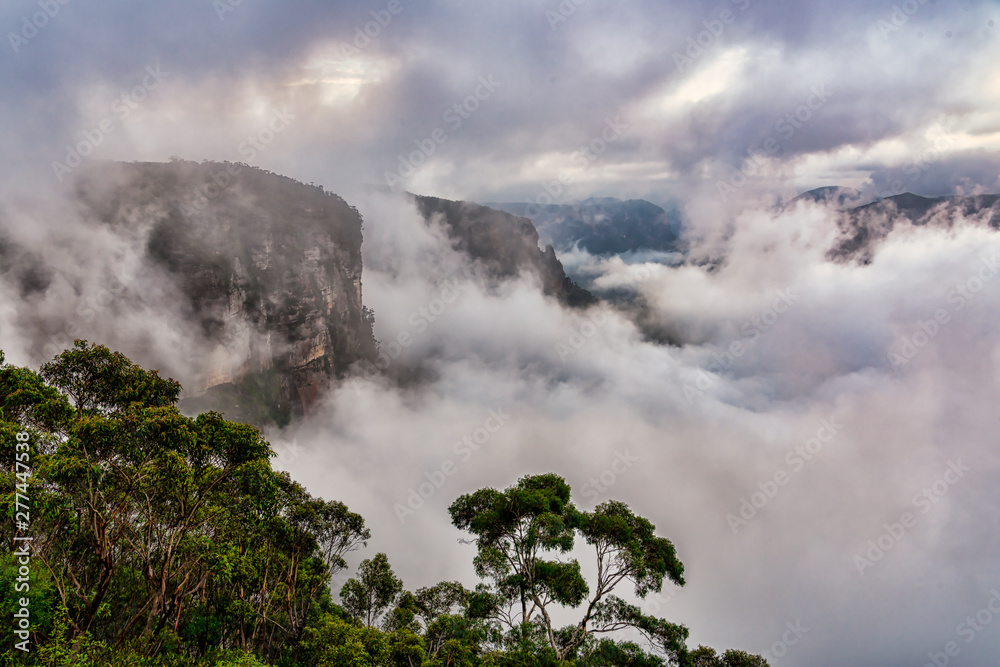 Govetts Leap lookout on a foggy morning, Blue Mountains, Australia.