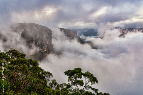 Govetts Leap lookout on a foggy morning, Blue Mountains, Australia.