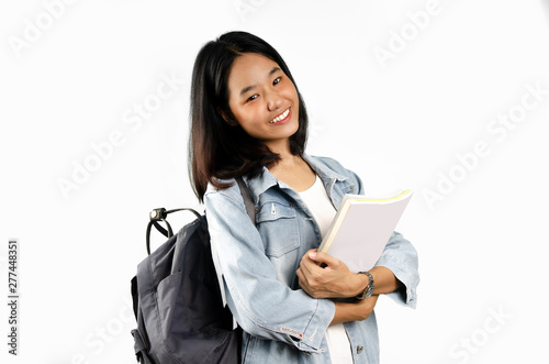 An Asian young student lady with the white background