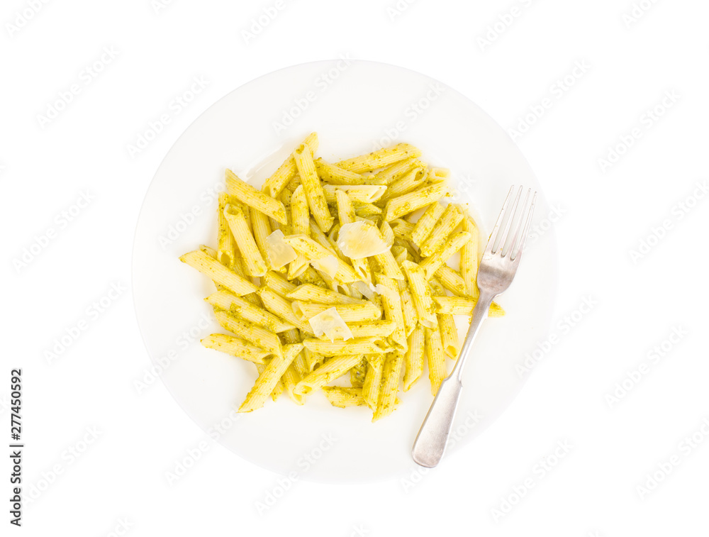 White plate with pasta and pesto