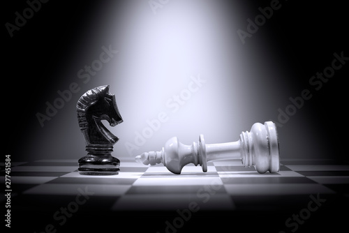 White king chess piece defe...