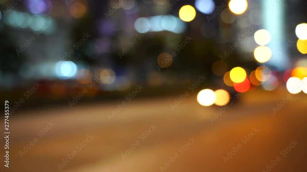 Hong Kong city night in blur; Bokeh view of Hong Kong Traffic at night Hong Kong city night in blur; Bokeh view of Hong Kong Traffic at night