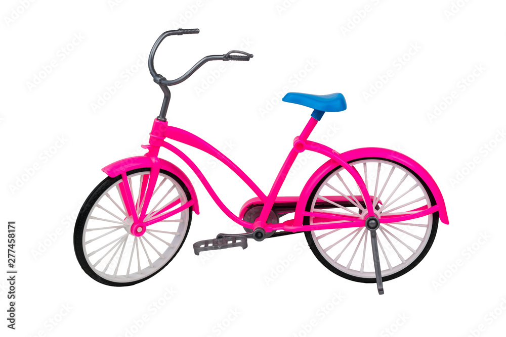 Toy pink bike with a blue seat isolated on white background.