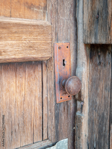 Details of the door knob and wood of the historic 1910 Cottonwood Cabin in Goodsprings, Nevada, USA. photo