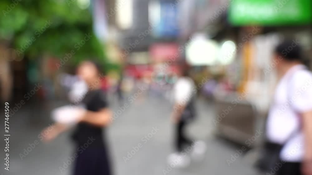 Blurred crowd of people on Hong Kong busy crosswalk; Slow Motion Blurred crowd of people on Hong Kong busy crosswalk; Slow Motion