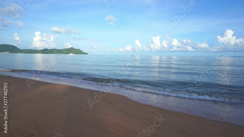 Daytime island beach seafront waves flux and splash photo