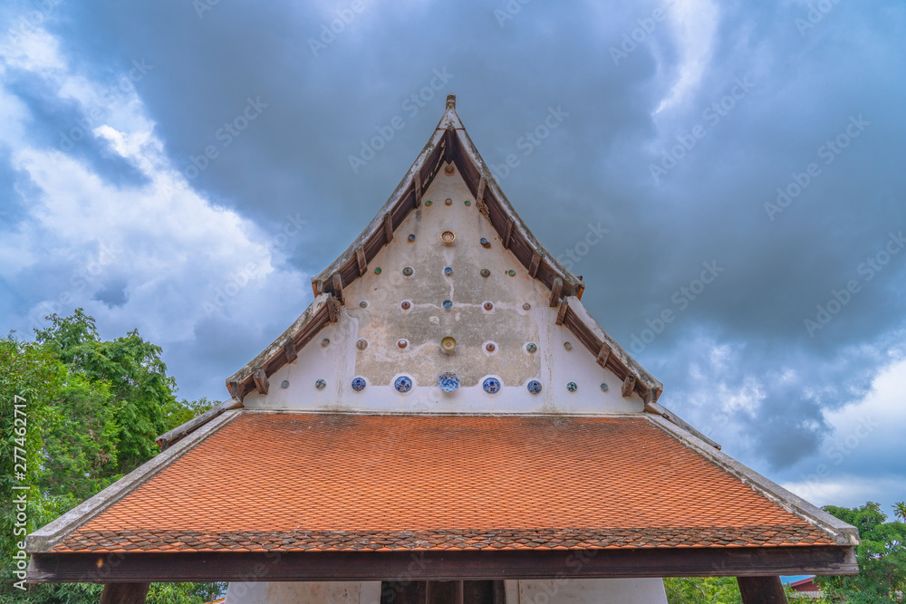 beautiful Chinaware bowls decorated on the wall of church at wat Ban Lang temple in Rayong province Thailand. the old church was built in Ayutthaya period