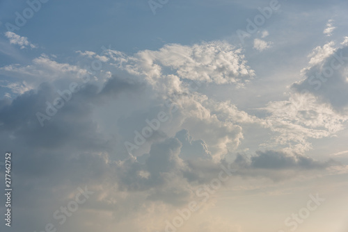 Cloudy landscape on blue sky at dusk in sunny day