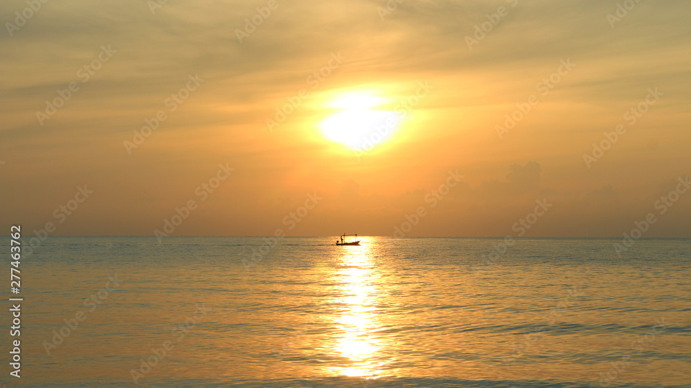 fisherman sailing and sunset on the sea