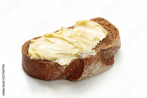 butter with bread isolated on white background