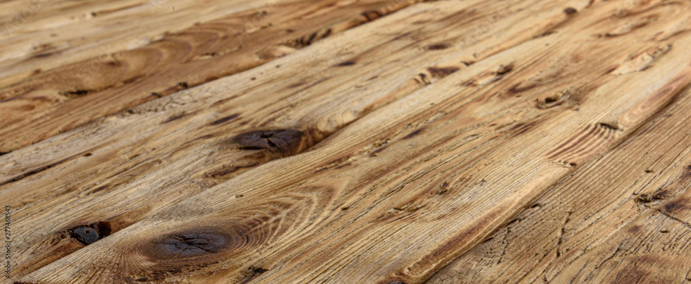 Texture of old natural wooden boards. Background of a wooden surface Texture of old natural wooden boards. Background of a wooden surface