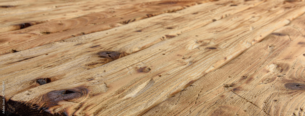 Texture of old natural wooden boards. Background of a wooden surface Texture of old natural wooden boards. Background of a wooden surface