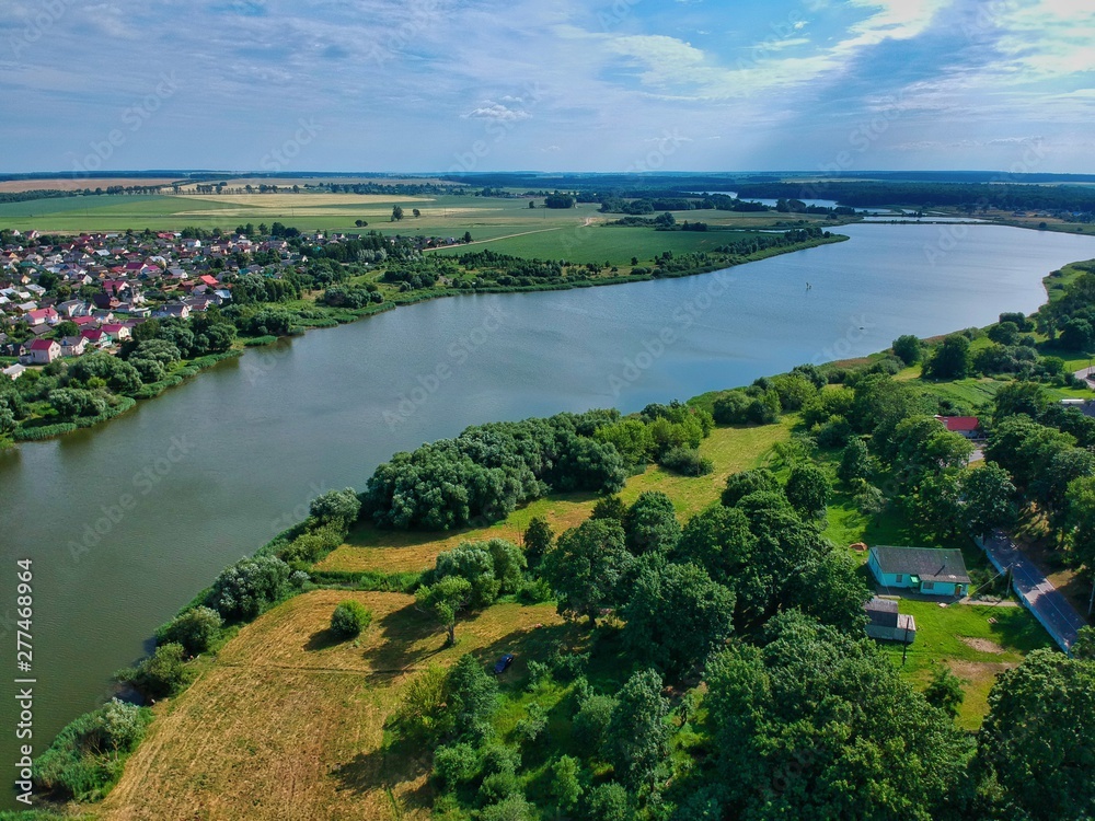 Fototapeta premium landscape with river and blue sky